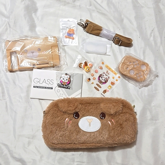 Nintendo carrying case plus accessories. - Picture 2 of 10